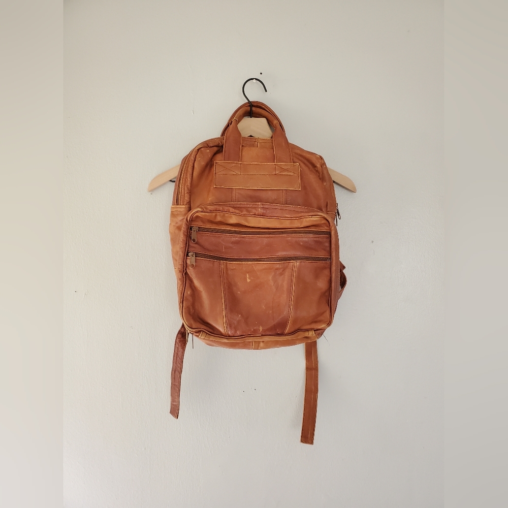 vintage cognac leather backpack
